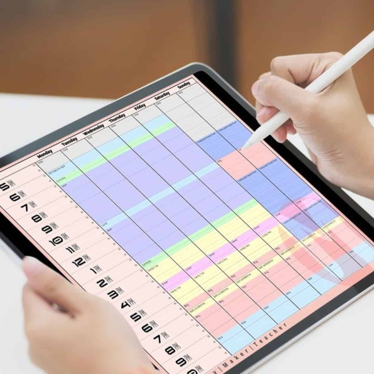 Woman using time blocking planner on her ipad. 