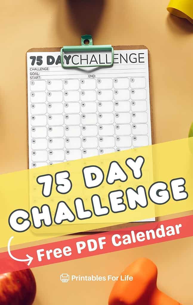 75 day challenge calendar on a clipboard on a table with healthy things.