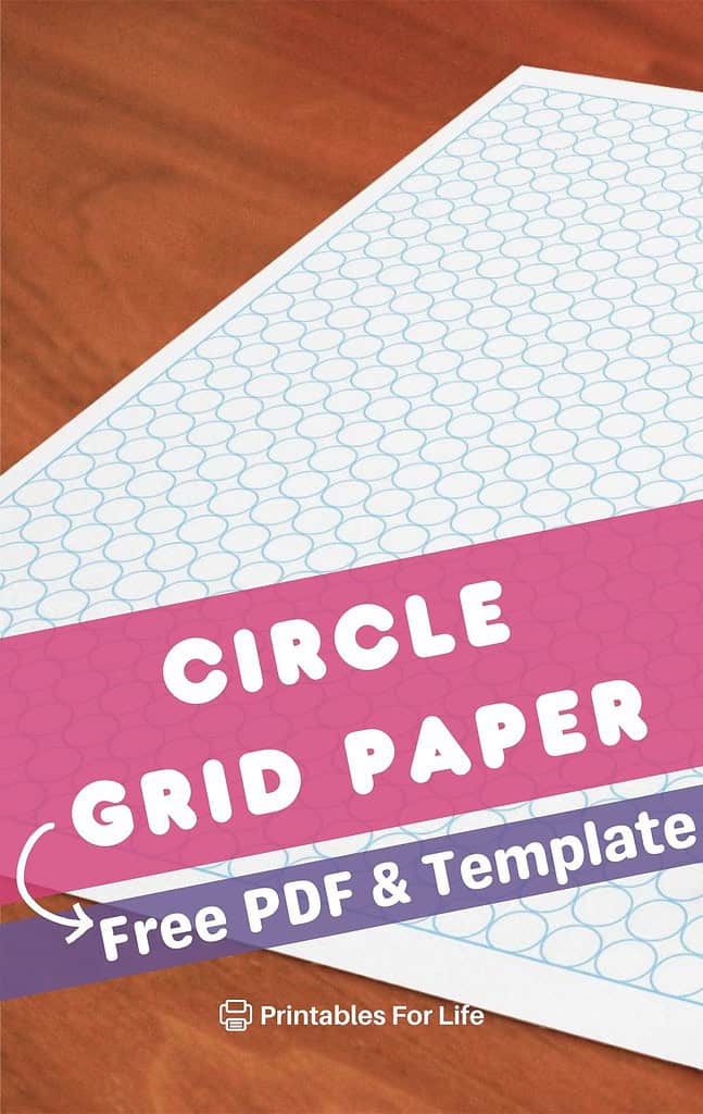A close-up of circle dot grid paper on a wooden table.