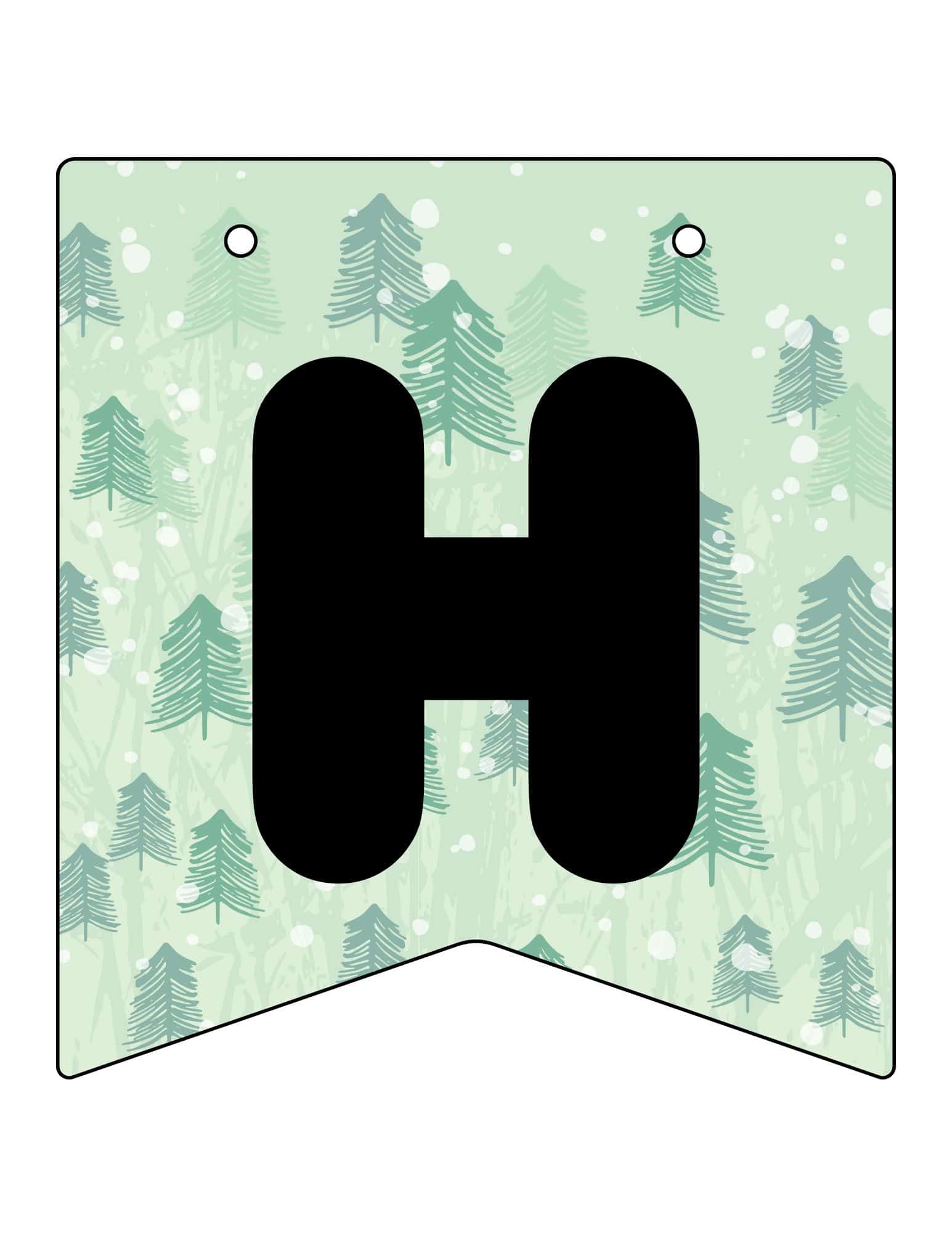 Printable Christmas banner with a bold black H on a snowy forest background.