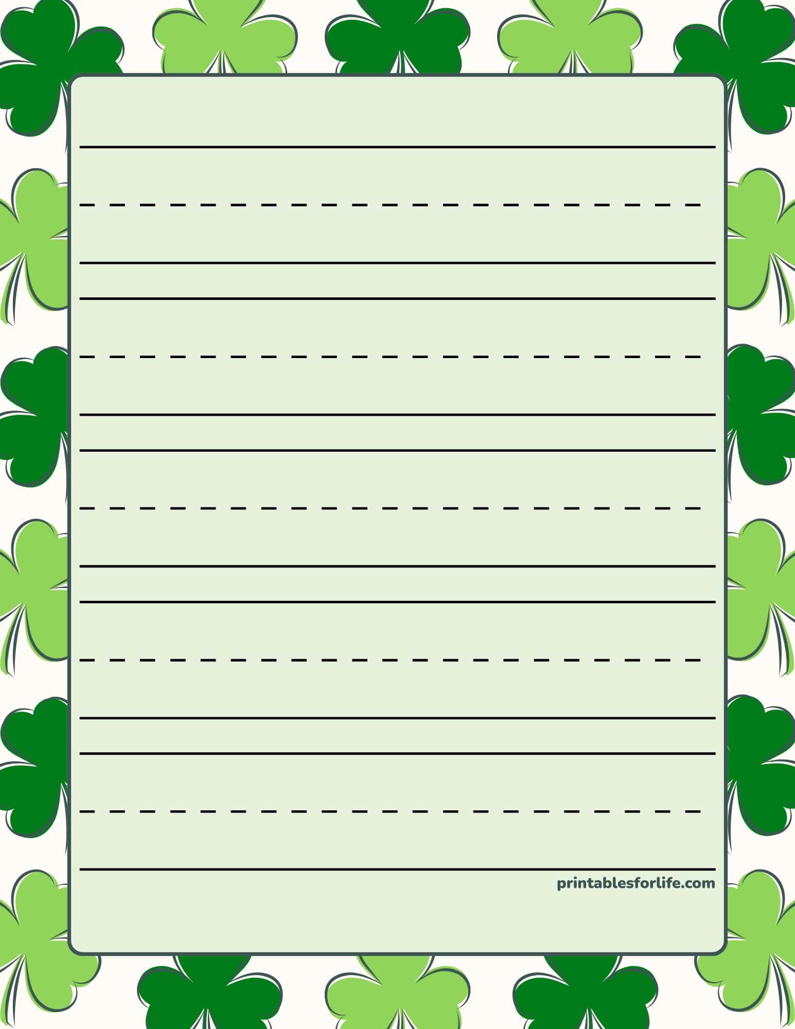 St. Patrick's Day handwriting paper with light green lines and a shamrock border.